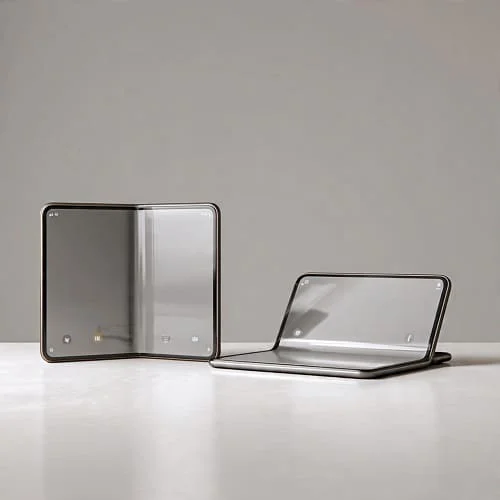 Two foldable phones opened at different angles showing book‑style and compact designs