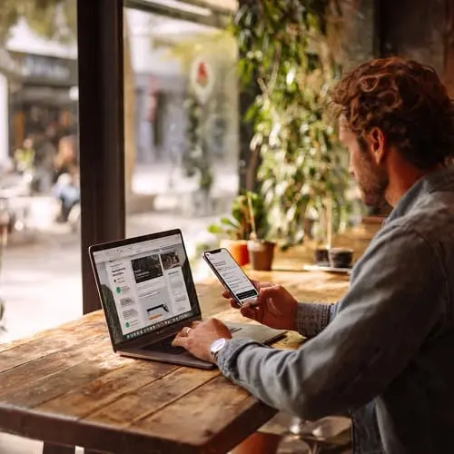 Comparing Galaxy S25 Ultra carrier plans on laptop and phone
