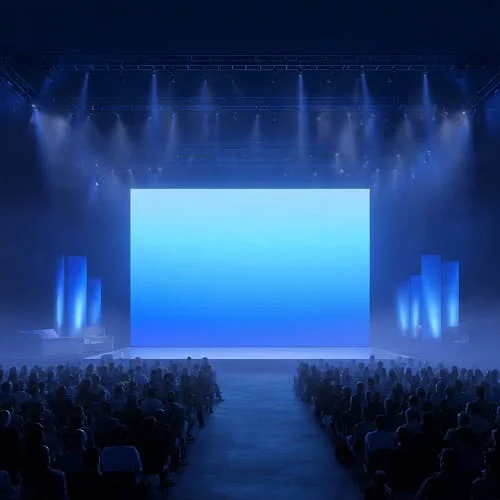 Keynote stage prepared for a live tech event with lights and LED screens