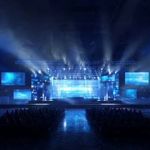Keynote stage prepared for a live tech event with LED screen and lights