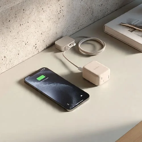 Smartphone charging via USB‑C with compact GaN charger and braided cable