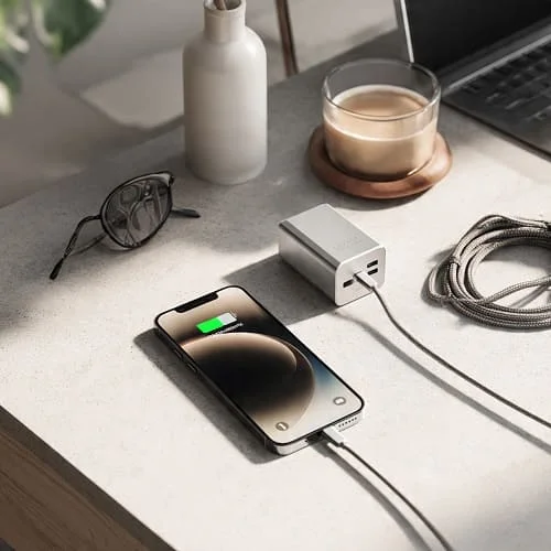 iPhone charging via USB‑C with compact GaN charger and braided cable