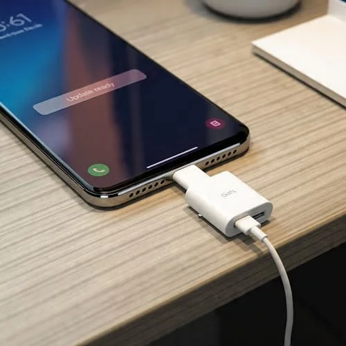 Phone connected to USB‑C charger with update ready banner