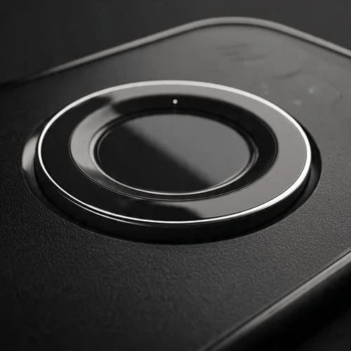 Magnetic wireless charger aligning to a case ring on a smartphone